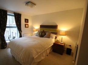 Master bedroom is also stylish and warm